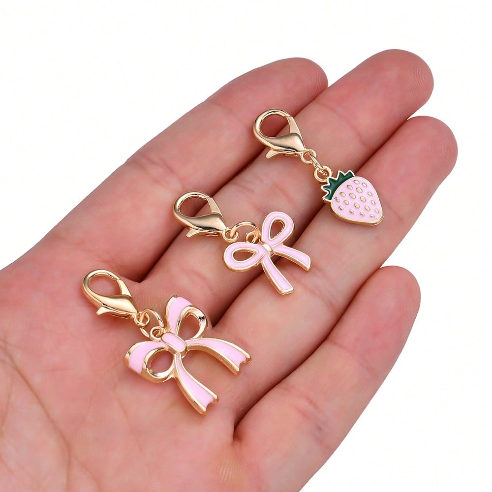 10-Piece Random Pink Bow Enamel Charms with Lobster Clasps