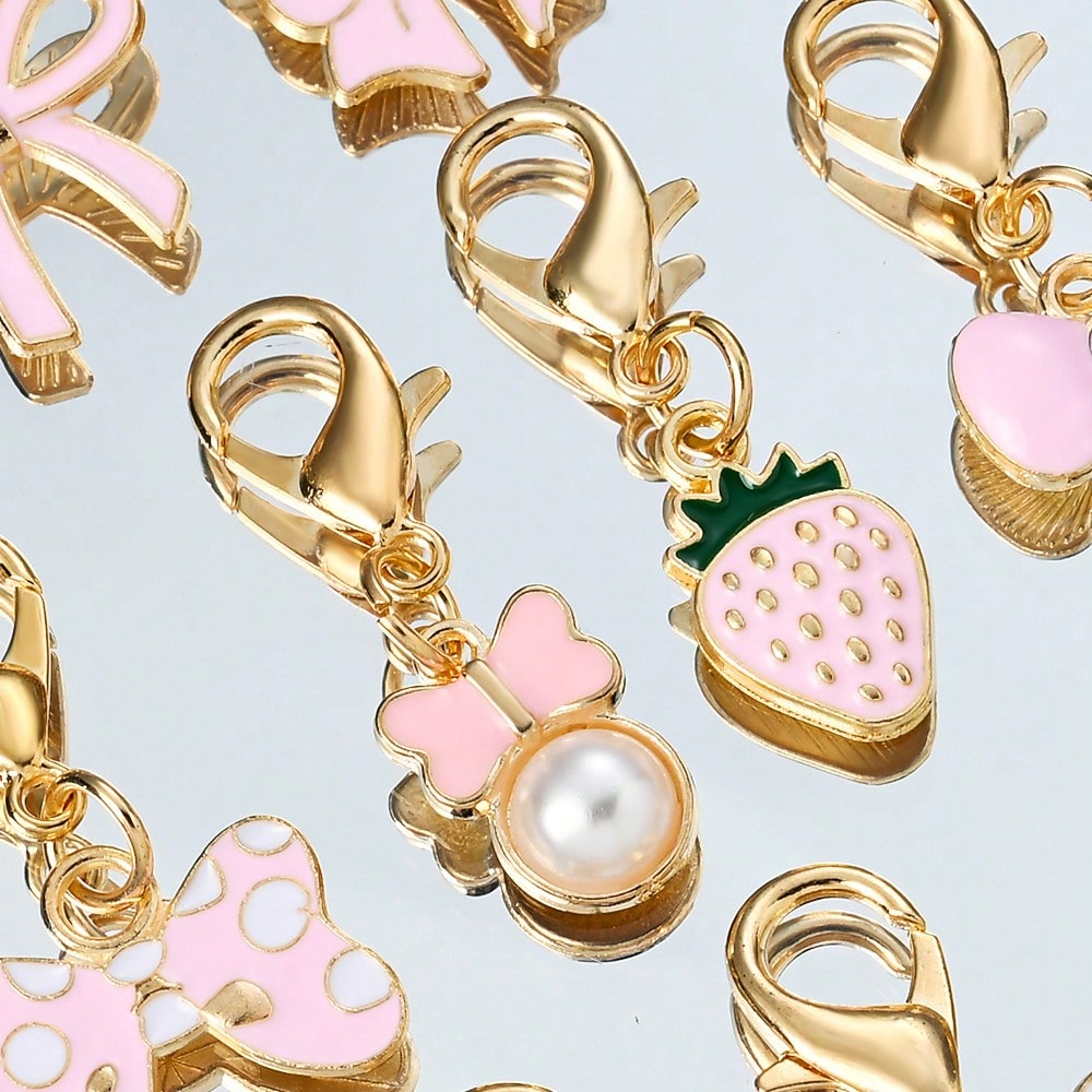 10-Piece Random Pink Bow Enamel Charms with Lobster Clasps
