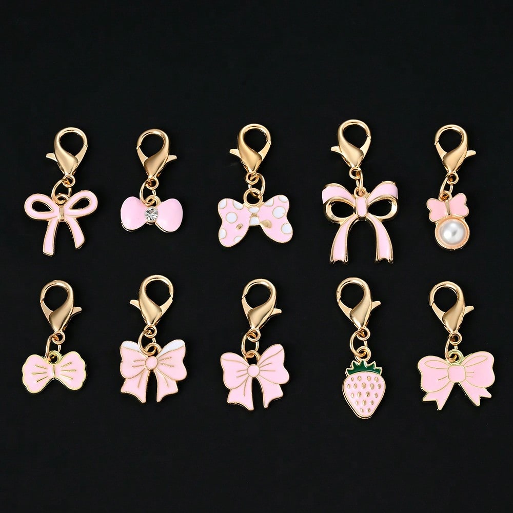 10-Piece Random Pink Bow Enamel Charms with Lobster Clasps