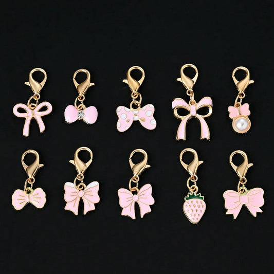 10-Piece Random Pink Bow Enamel Charms with Lobster Clasps